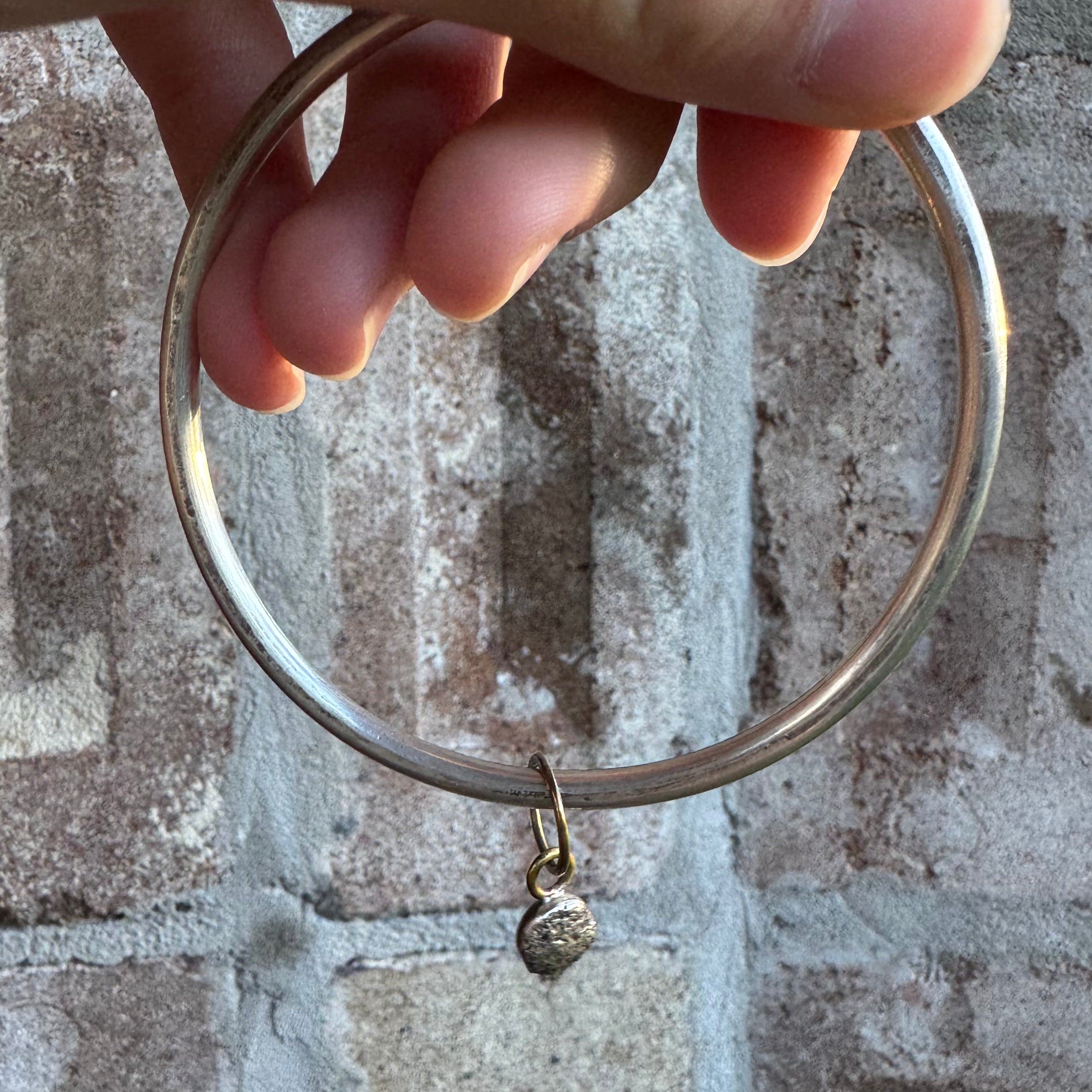 Silver bangle with Silver Charm - Jane Hodgetts